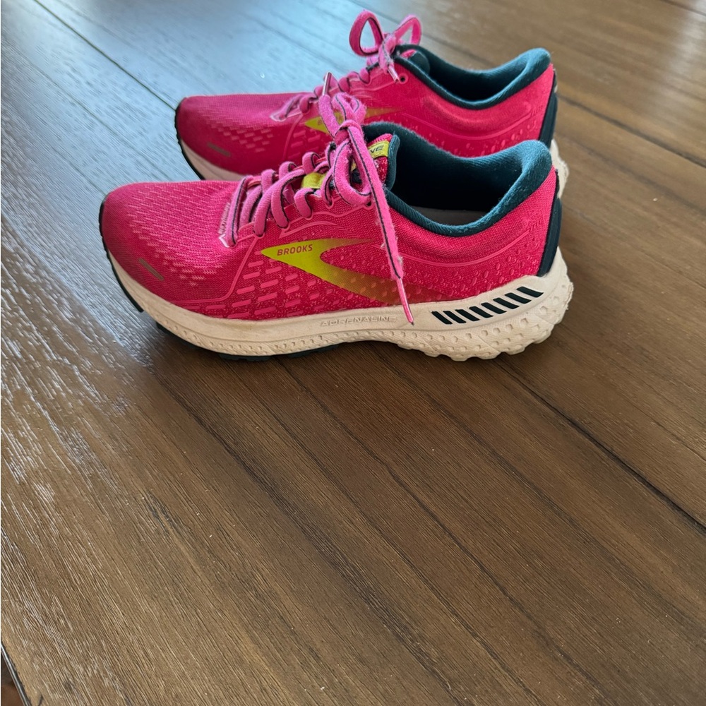 Brooks pink, navy and yellow adrenaline 21 athletic shoes